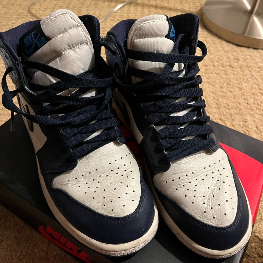 Jordan 1s- retro obsidian/ university blue color way